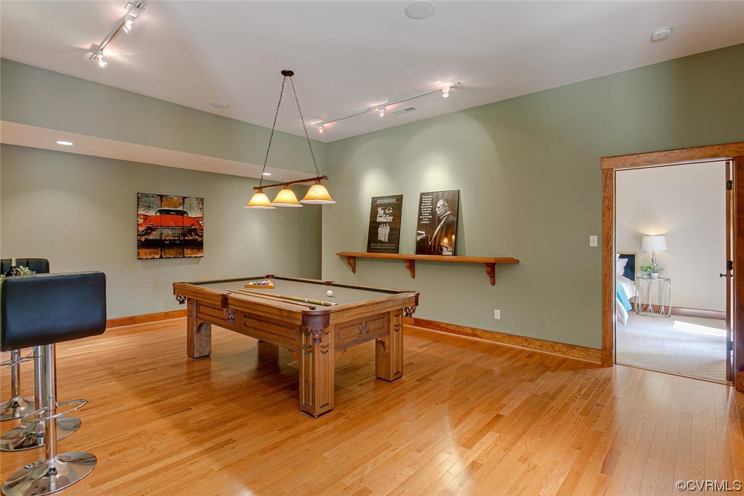 3535 Meadow Road Sandston, VA 23150 - Photo 35 of 50 a room with wooden floor table tennis and arcade game machine