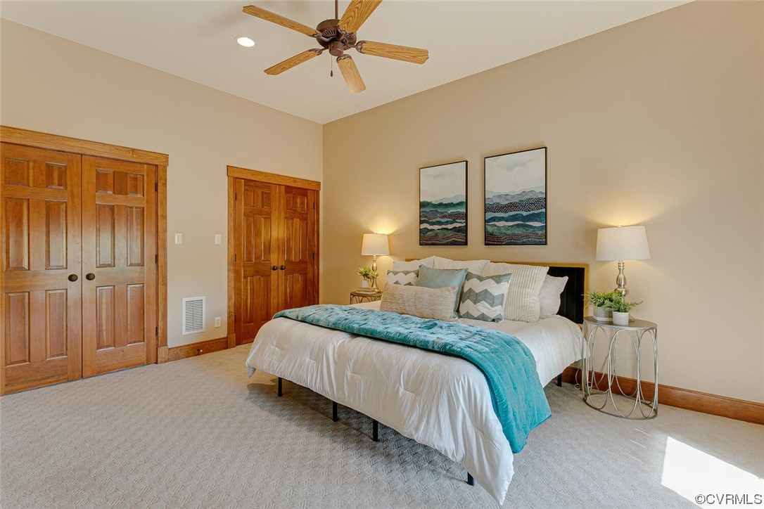3535 Meadow Road Sandston, VA 23150 - Photo 38 of 50 a bedroom with a bed and a chandelier