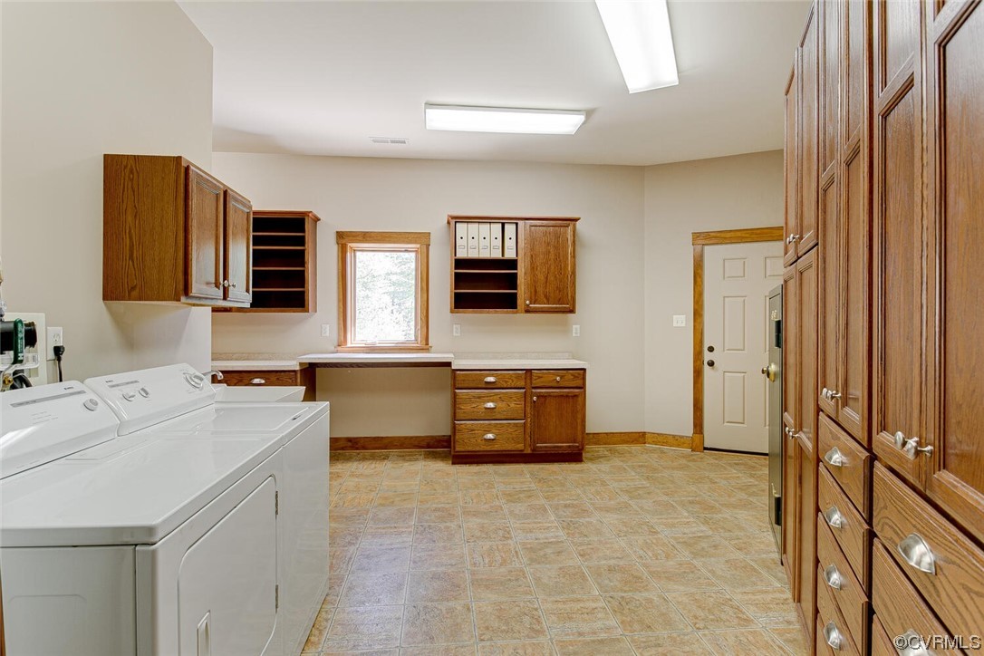 3535 Meadow Road Sandston, VA 23150 - Photo 41 of 50 a bathroom with a granite countertop sink a mirror and a bathtub
