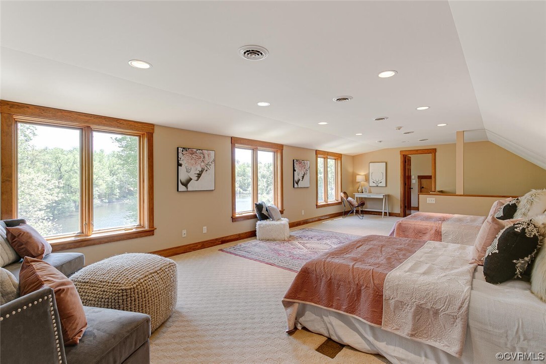 3535 Meadow Road Sandston, VA 23150 - Photo 43 of 50 a spacious bedroom with a bed and glass window