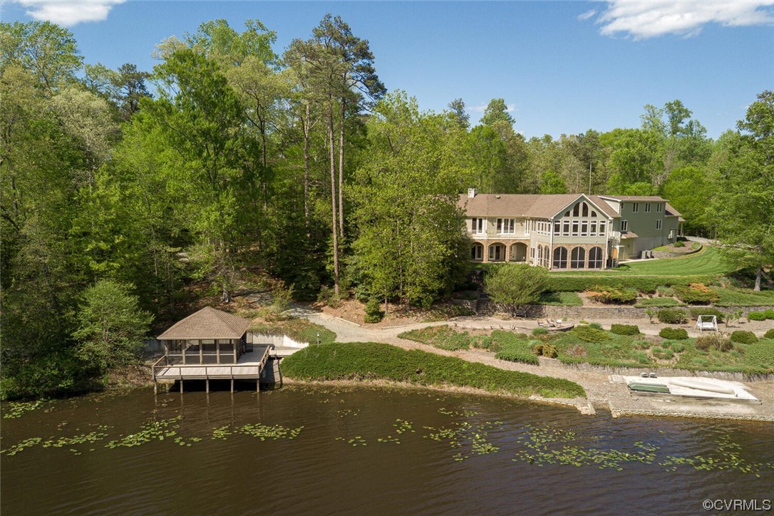 3535 Meadow Road Sandston, VA 23150 - Photo 5 of 50 a swimming pool with trees in the background