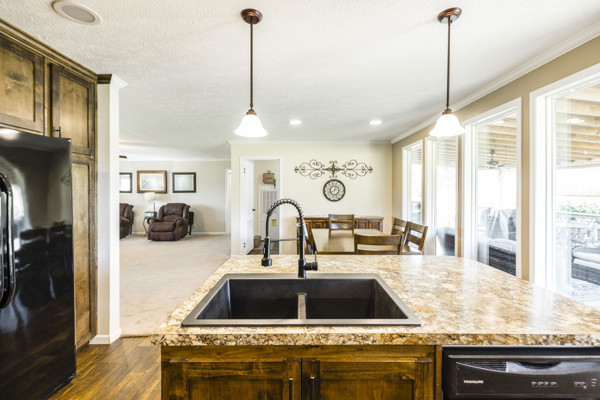 4265 Armstrong Road Springfield, TN 37172 - Photo 27 of 57 a kitchen with a sink a counter top space and stainless steel appliances
