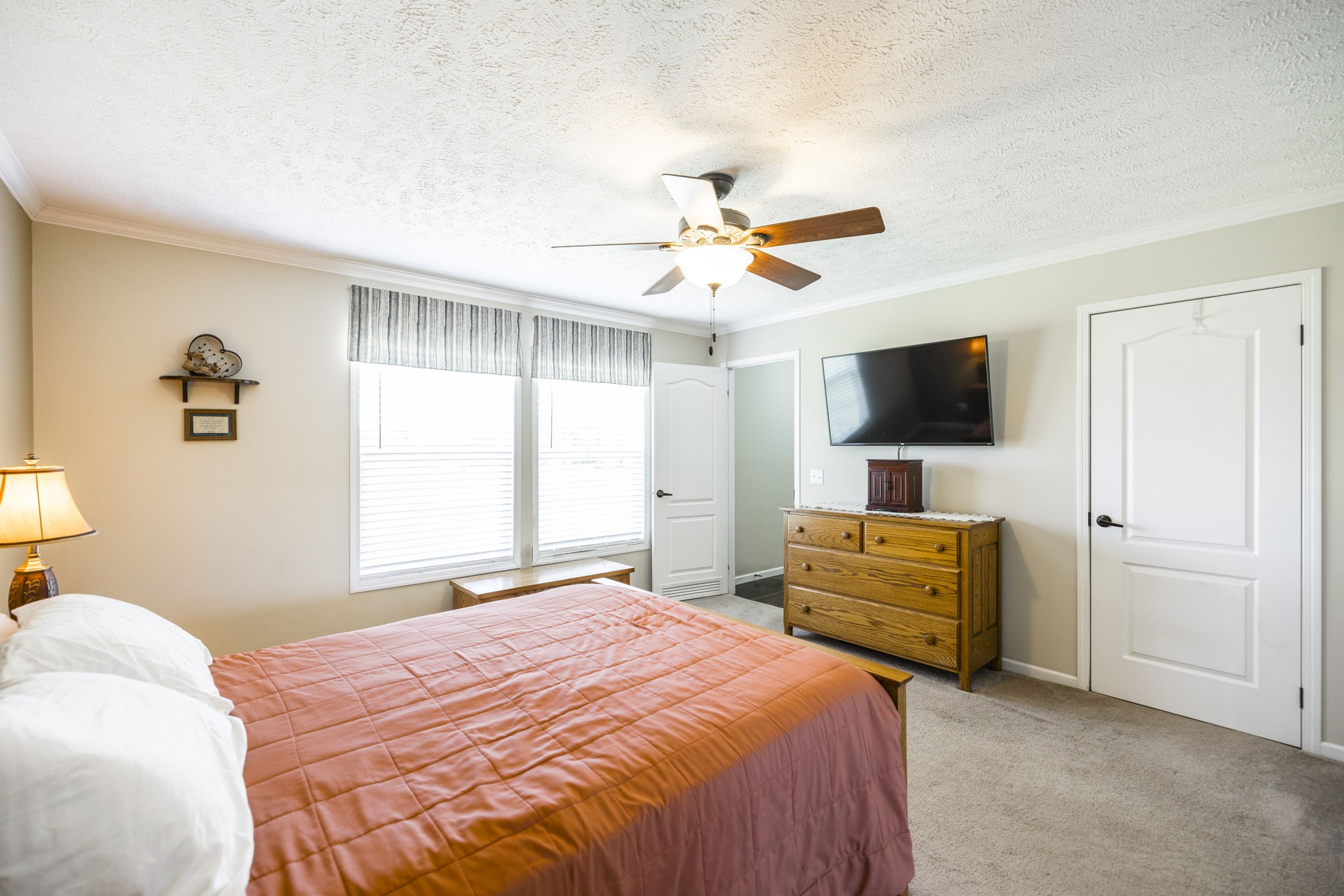 4265 Armstrong Road Springfield, TN 37172 - Photo 30 of 57 a bedroom with a bed and a flat screen tv