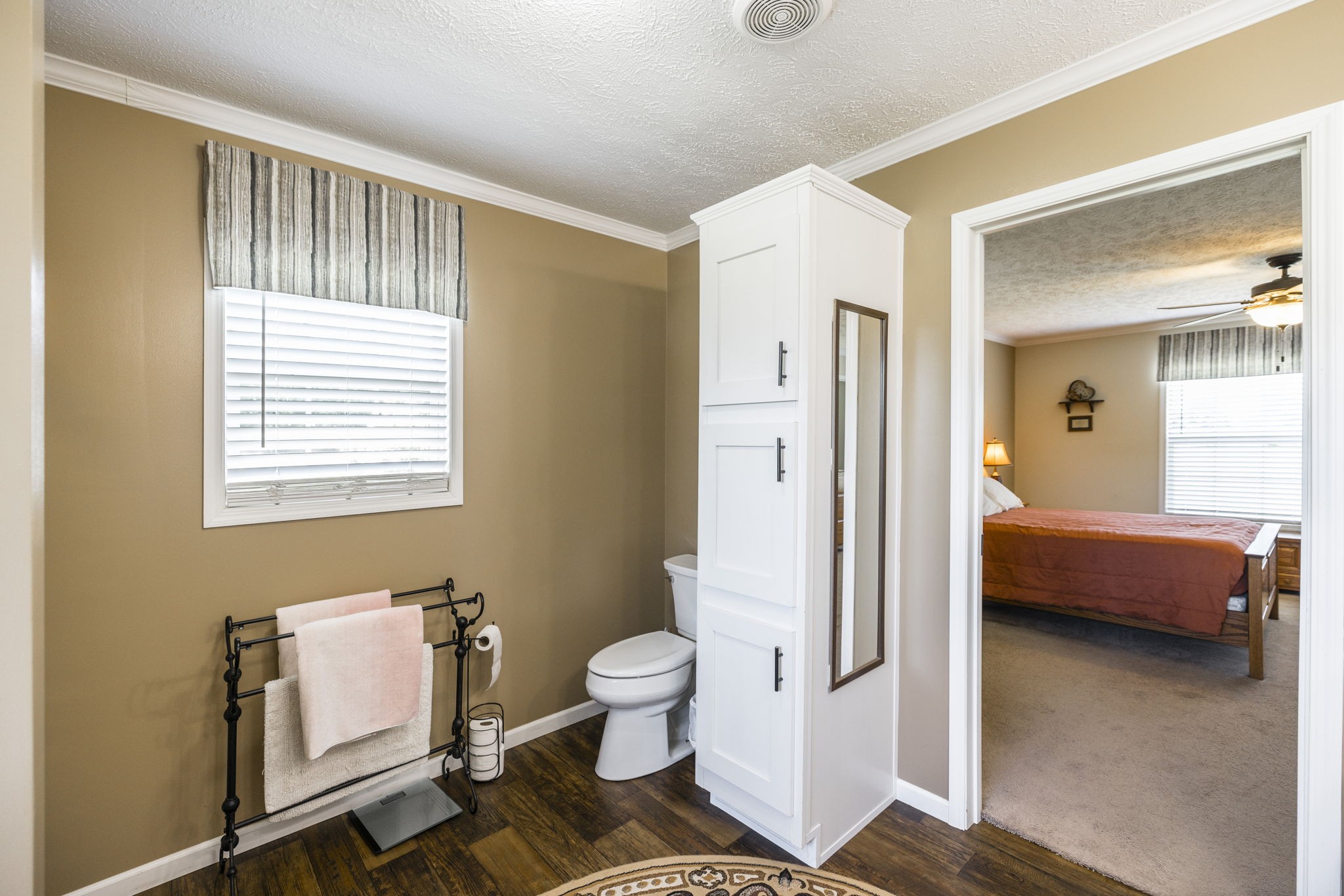 4265 Armstrong Road Springfield, TN 37172 - Photo 34 of 57 a spacious bathroom with a toilet sink and a mirror