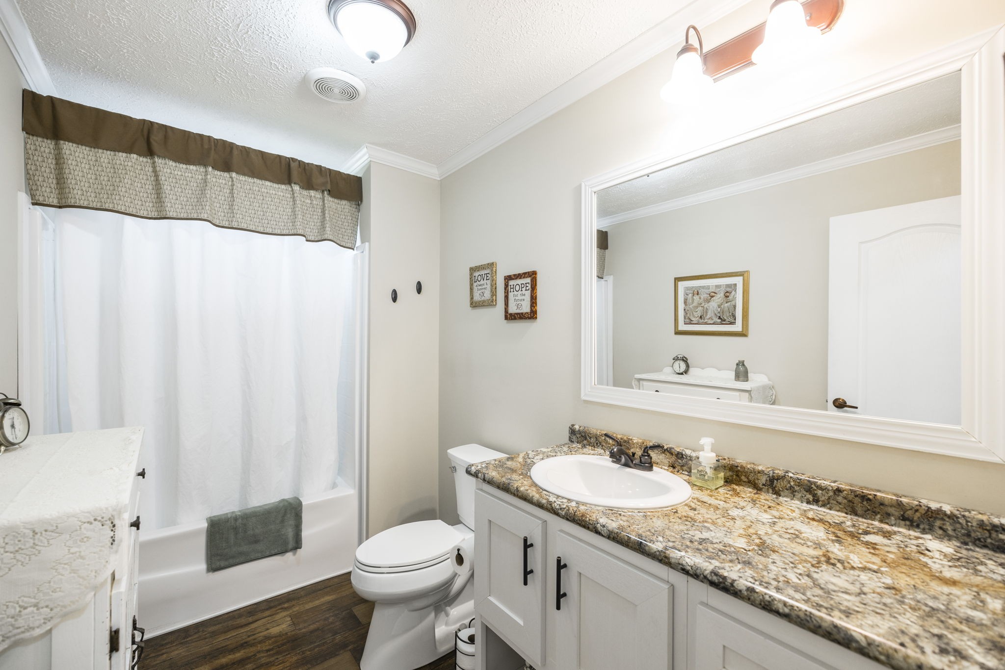 4265 Armstrong Road Springfield, TN 37172 - Photo 36 of 57 a bathroom with a granite countertop sink and a mirror