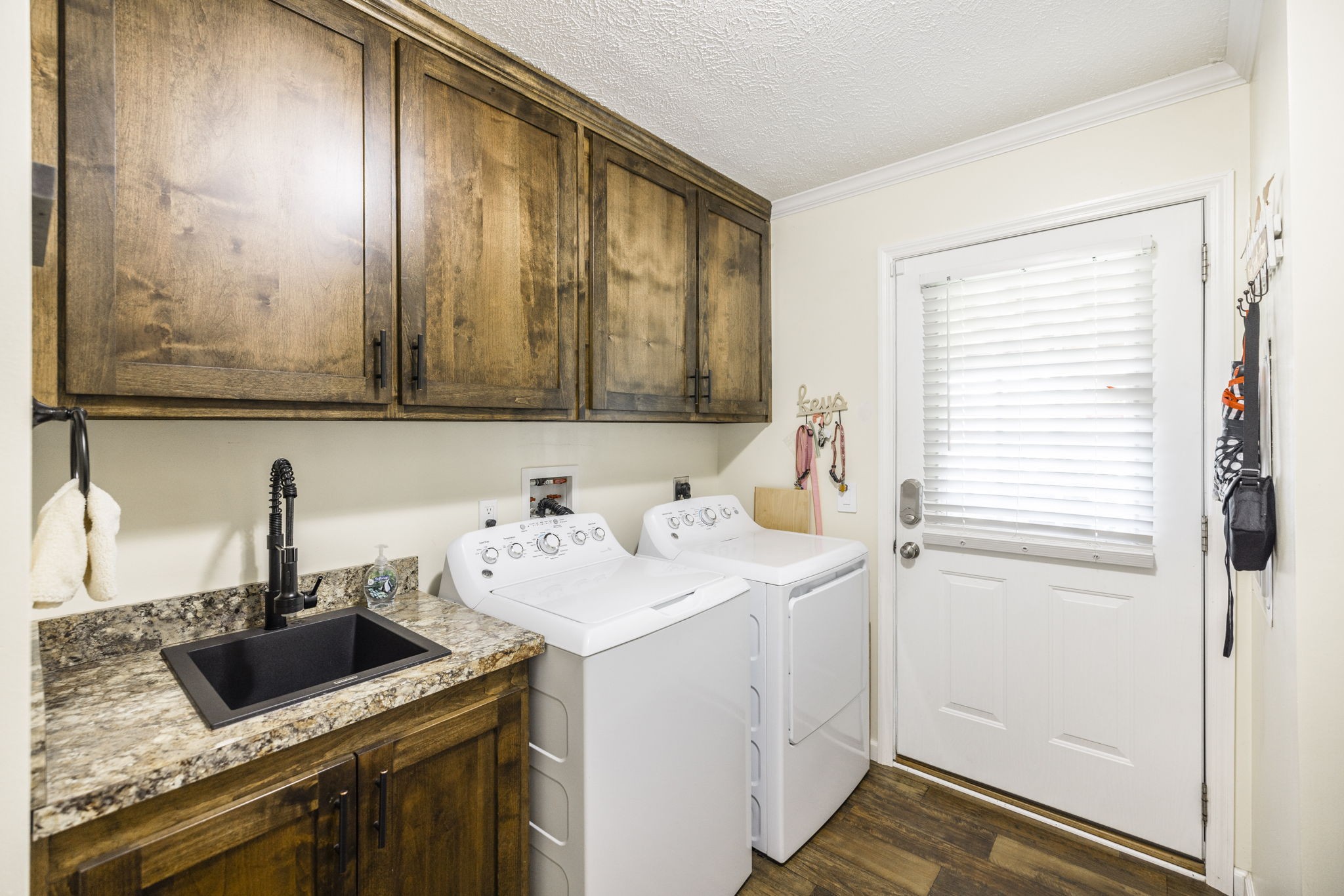 4265 Armstrong Road Springfield, TN 37172 - Photo 40 of 57 a view of a sink and dishwasher with wooden floor
