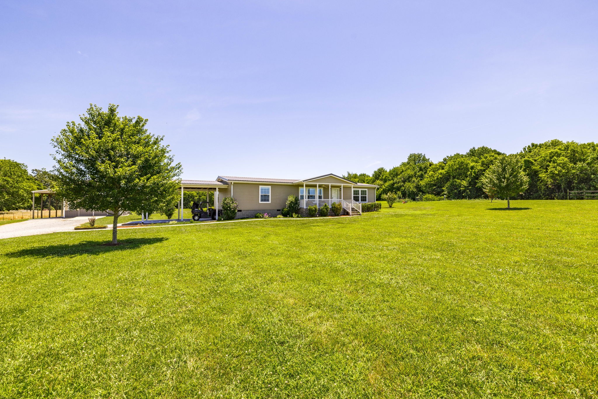4265 Armstrong Road Springfield, TN 37172 - Photo 4 of 57 a view of swimming pool and trees in the background