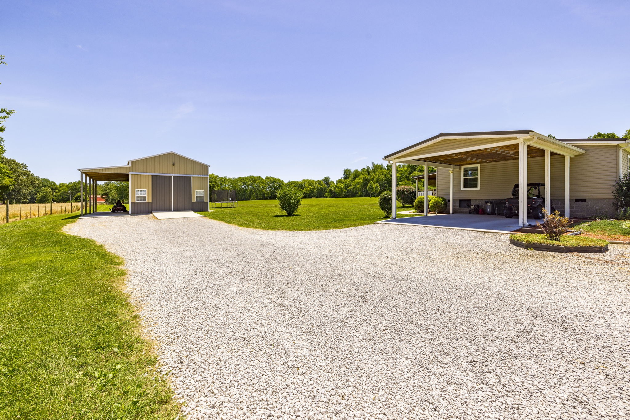 4265 Armstrong Road Springfield, TN 37172 - Photo 6 of 57 a view of a house with a yard and potted plants