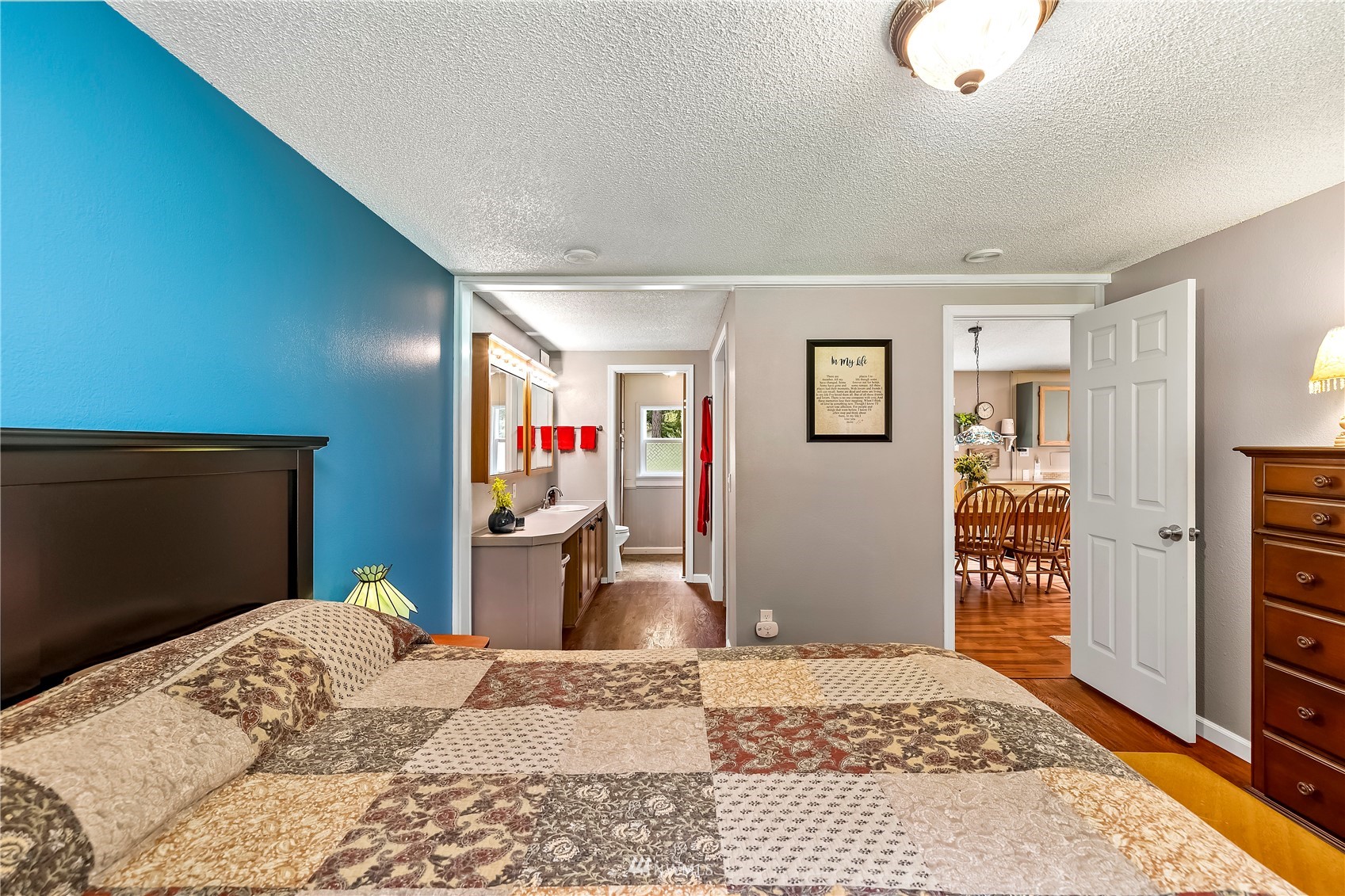 16820 Littlerock Road Southwest Rochester, WA 98579 - Photo 27 of 33 a bedroom with a bed and a television