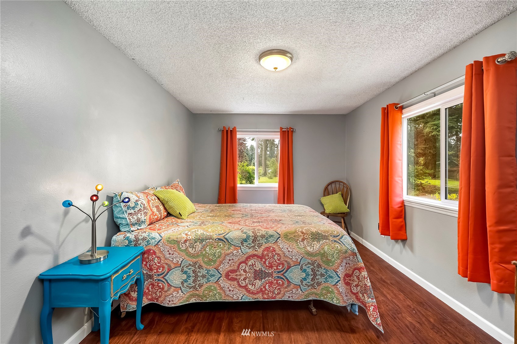 16820 Littlerock Road Southwest Rochester, WA 98579 - Photo 29 of 33 a bedroom with a bed and a window