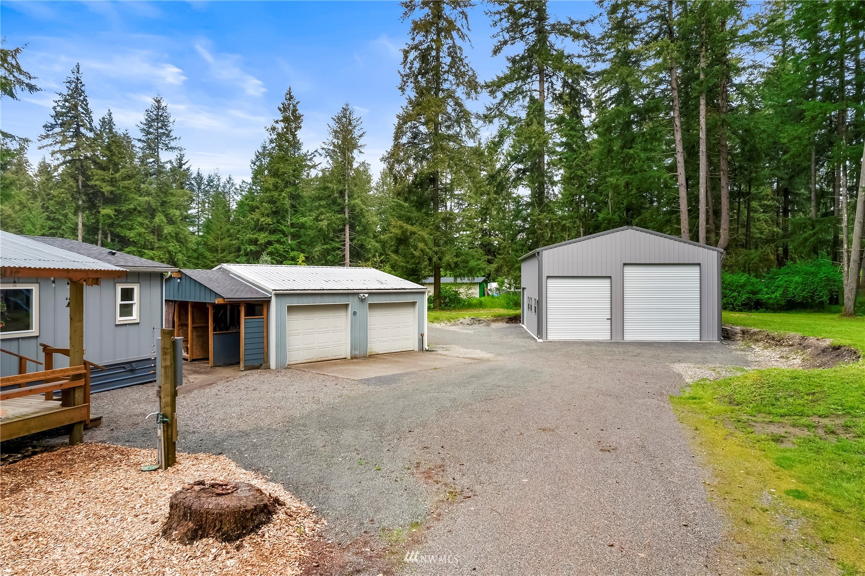 16820 Littlerock Road Southwest Rochester, WA 98579 - Photo 6 of 33 a backyard of a house with yard and tree