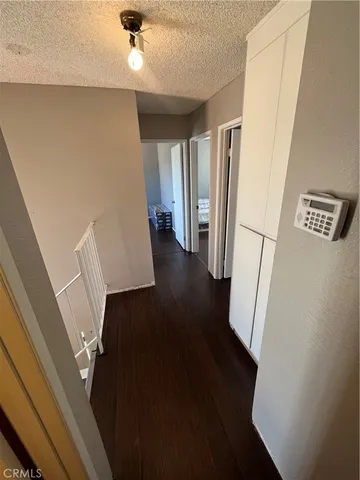 a view of a hallway view with staircase