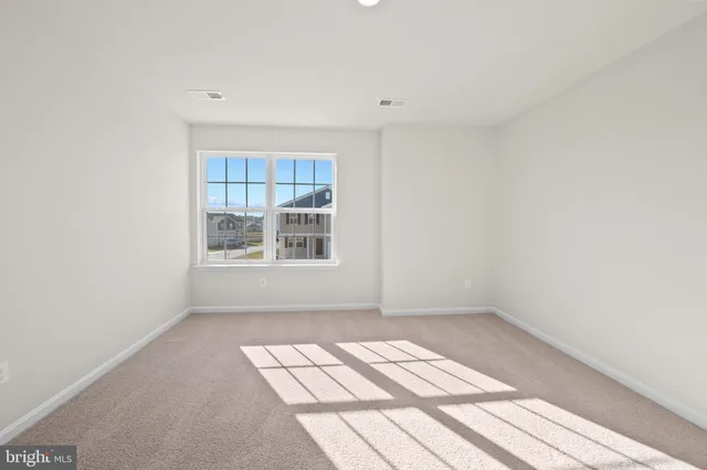 a view of a room that has a window in it