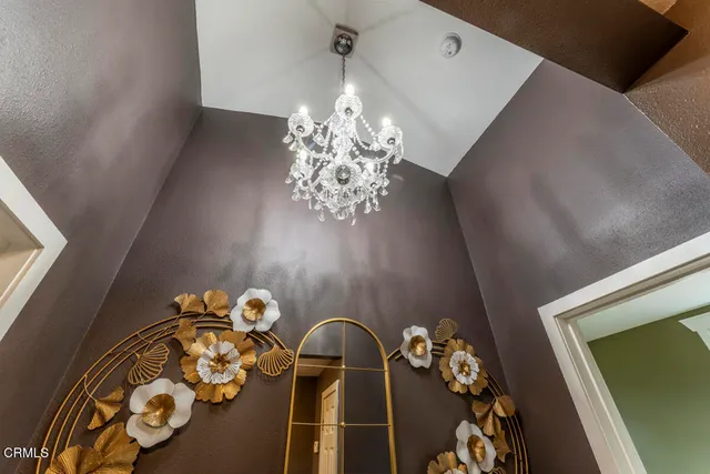 a room with a bed and a window