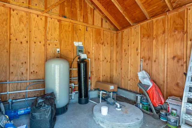 an aerial view of a house with outdoor space