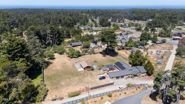 an aerial view of residential house with outdoor space