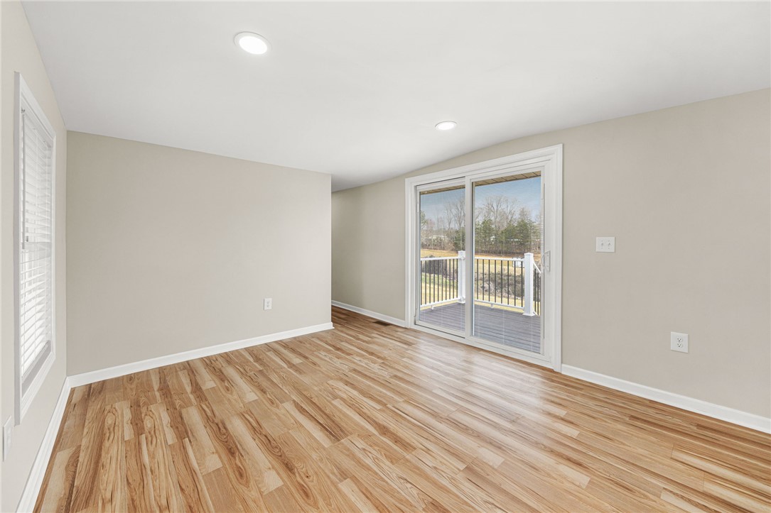 139 Davis Road Easley, SC 29640 - Photo 8 of 34 This bright space offers rich wood flooring and direct access to an outdoor deck, perfect for relaxation.