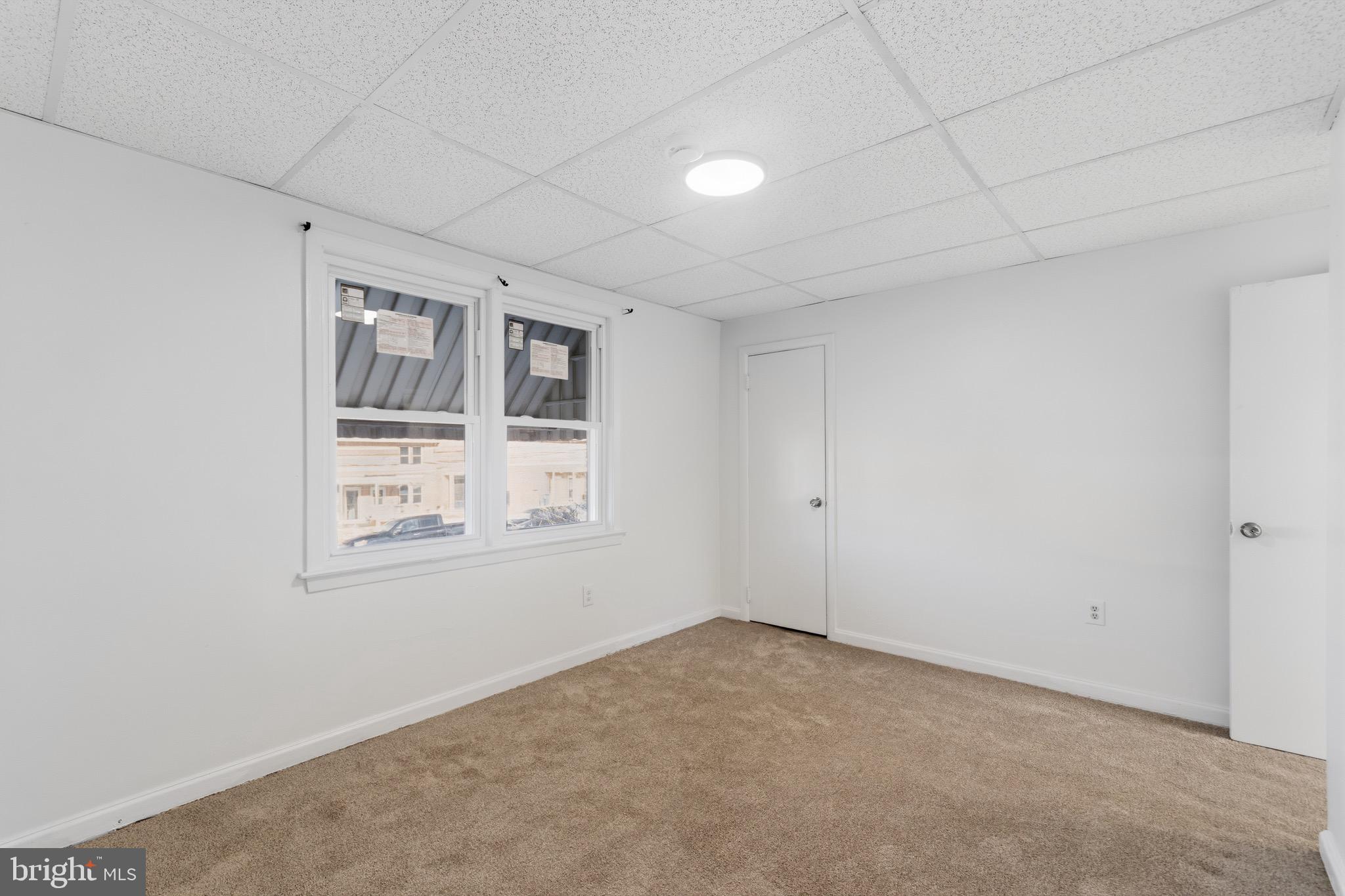 129 Brown Street Mount Holly, NJ 08060 - Photo 15 of 19 an empty room with windows