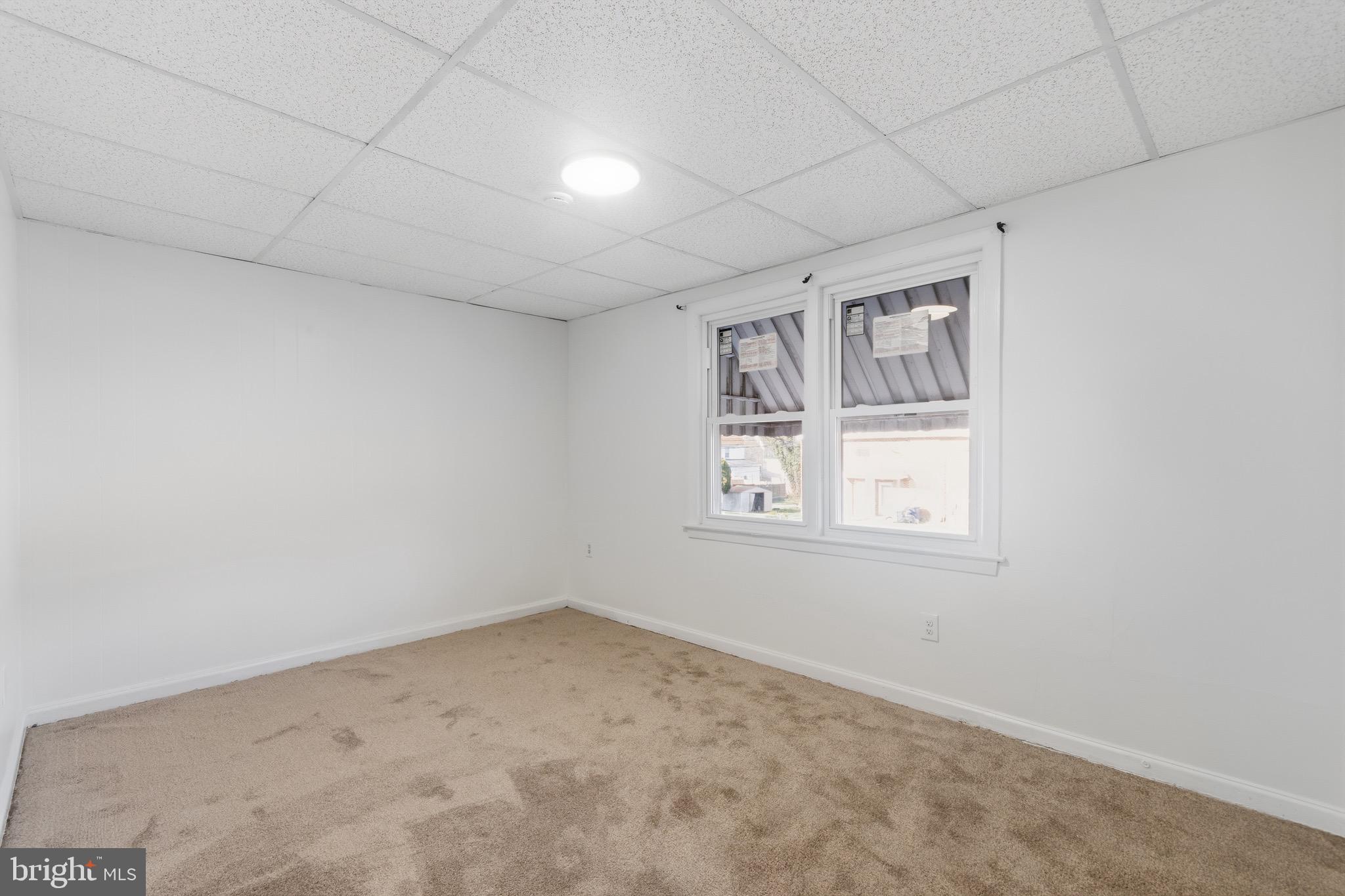129 Brown Street Mount Holly, NJ 08060 - Photo 16 of 19 an empty room with windows