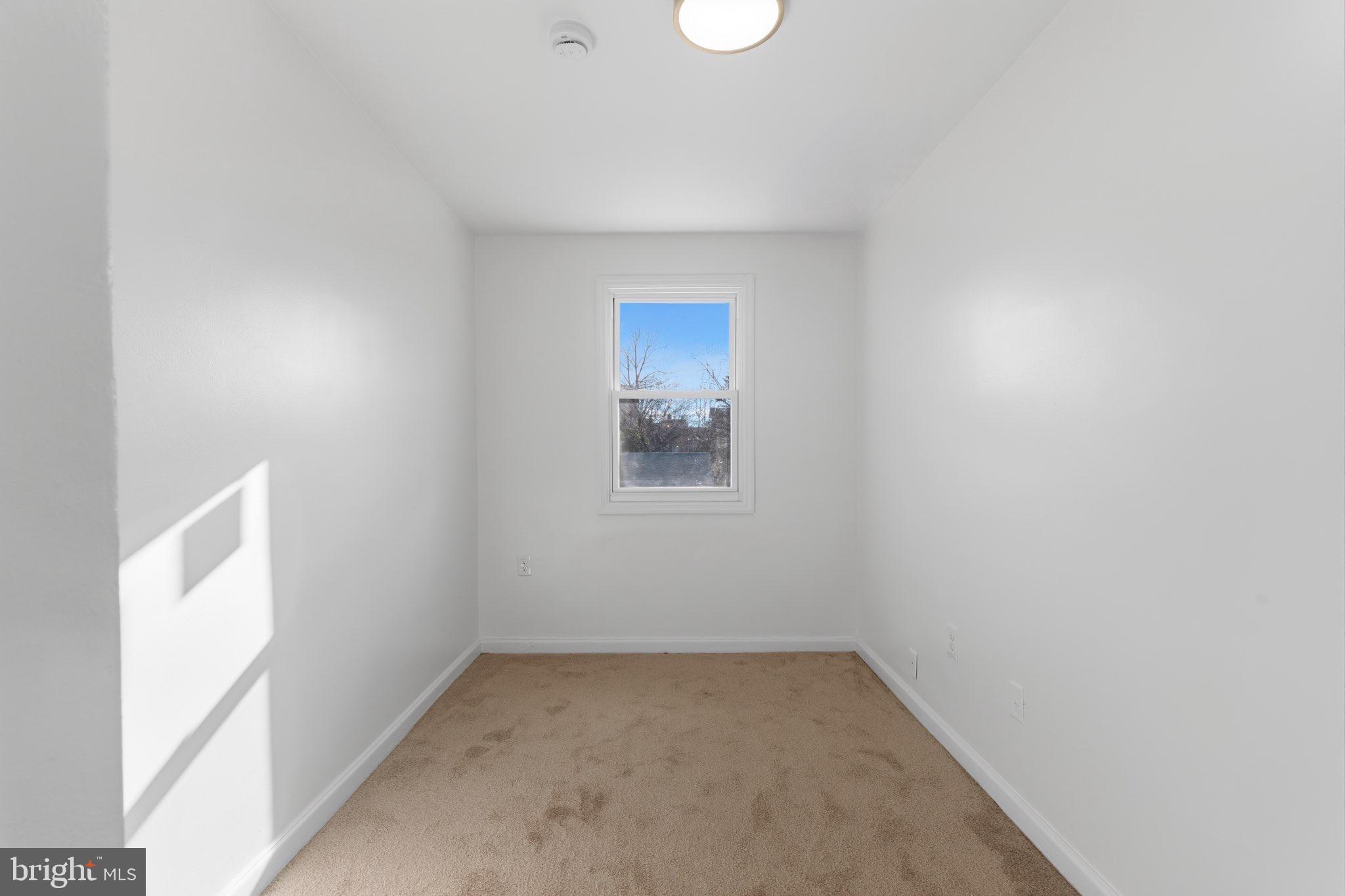129 Brown Street Mount Holly, NJ 08060 - Photo 9 of 19 a view of a small space with a window