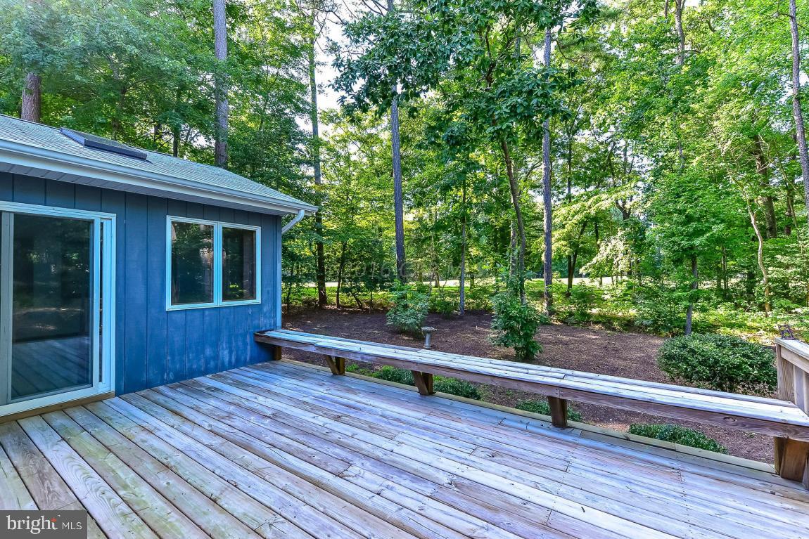 241 Windjammer Road Berlin, MD 21811 - Photo 33 of 38 a view of backyard with deck and wooden floor