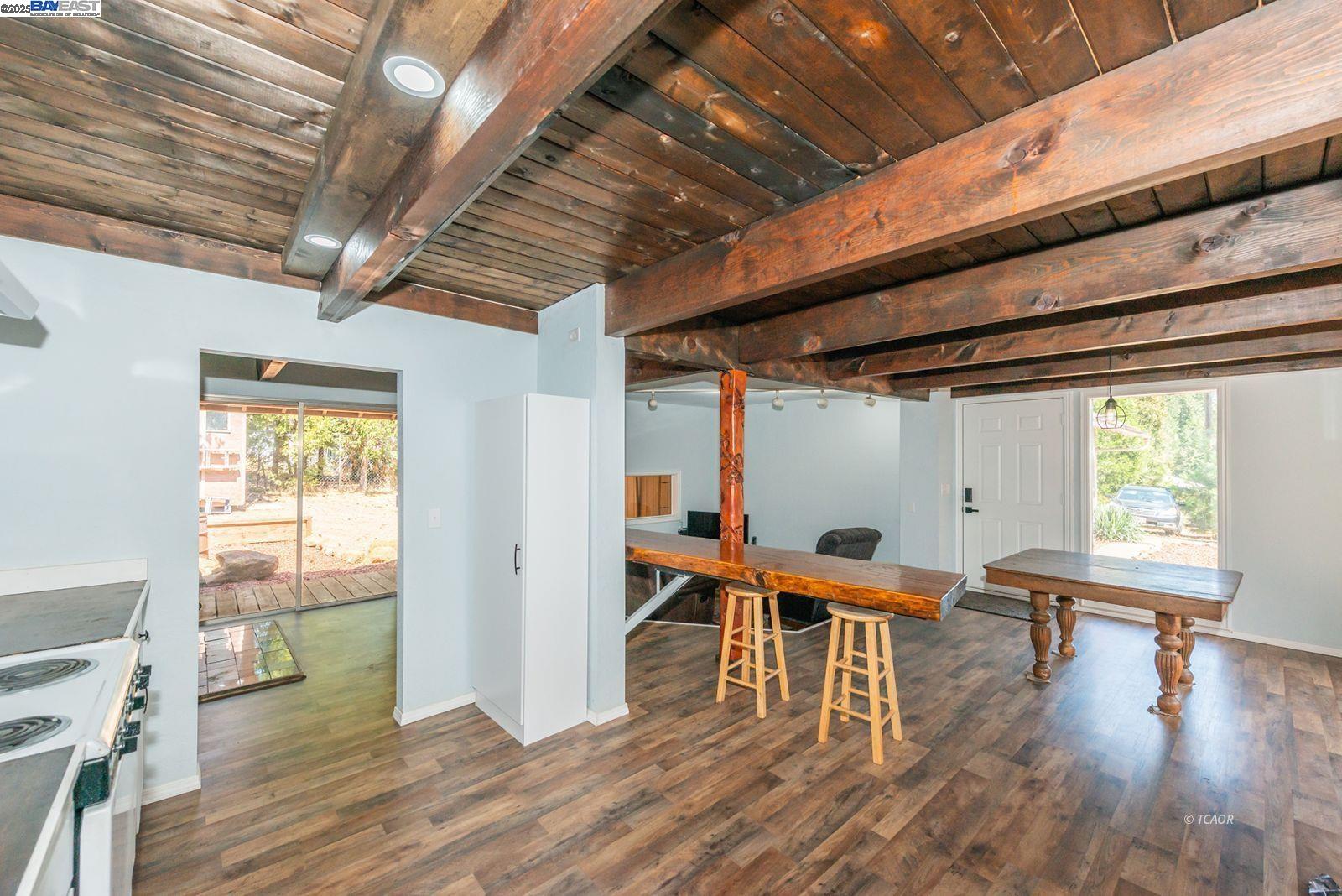230 Mary Avenue Trinity Center, CA 96091 - Photo 12 of 46 a room with lots of furniture and a wooden floor