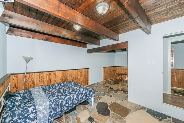 a view of balcony with furniture