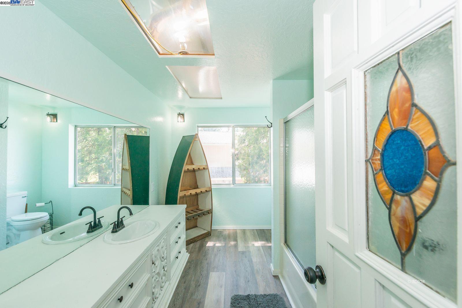 230 Mary Avenue Trinity Center, CA 96091 - Photo 24 of 46 a en suite bathroom with a sink and a large mirror