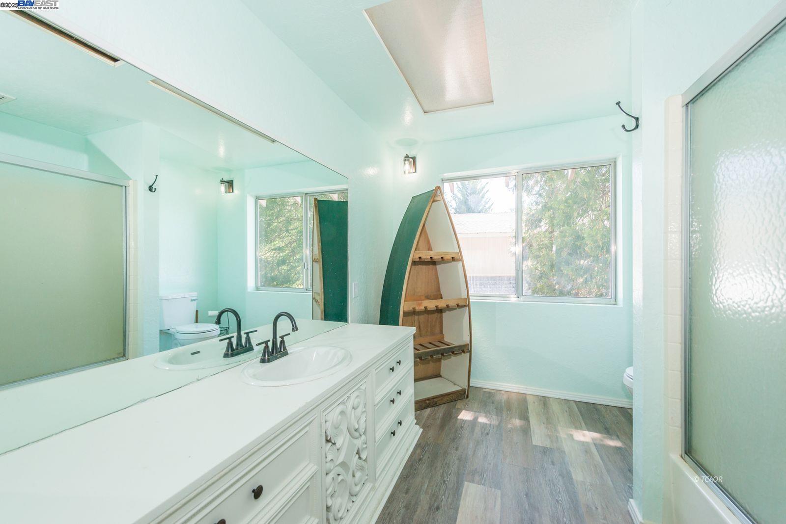 230 Mary Avenue Trinity Center, CA 96091 - Photo 25 of 46 a bathroom with a sink and a mirror