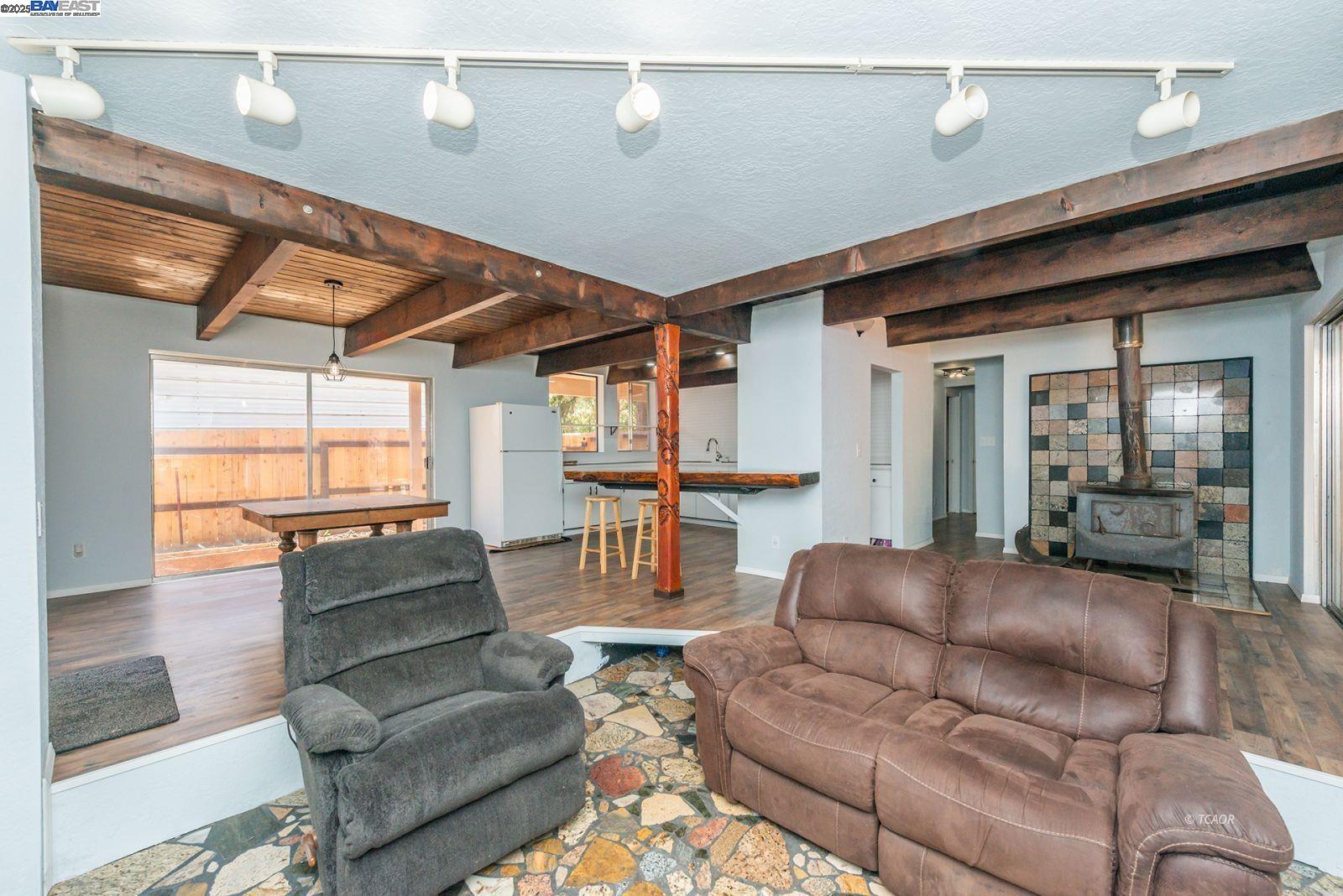 230 Mary Avenue Trinity Center, CA 96091 - Photo 3 of 46 a living room with furniture and a large window