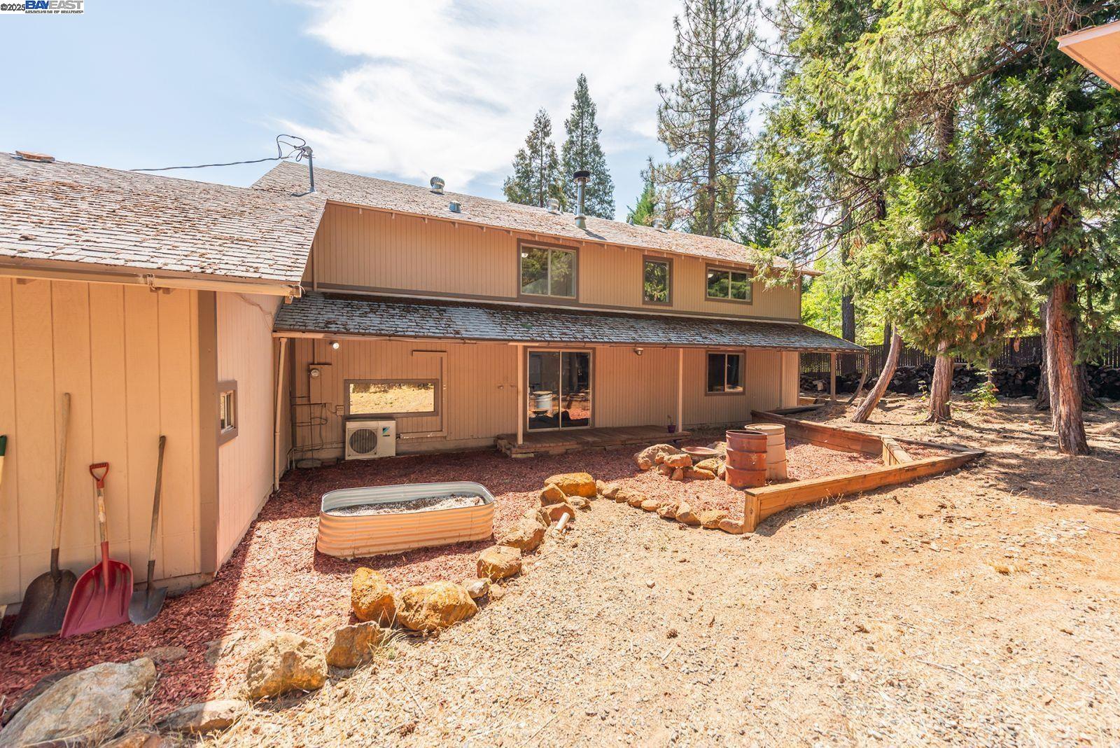 230 Mary Avenue Trinity Center, CA 96091 - Photo 35 of 46 a front view of a house with trees covered with snow in front of house