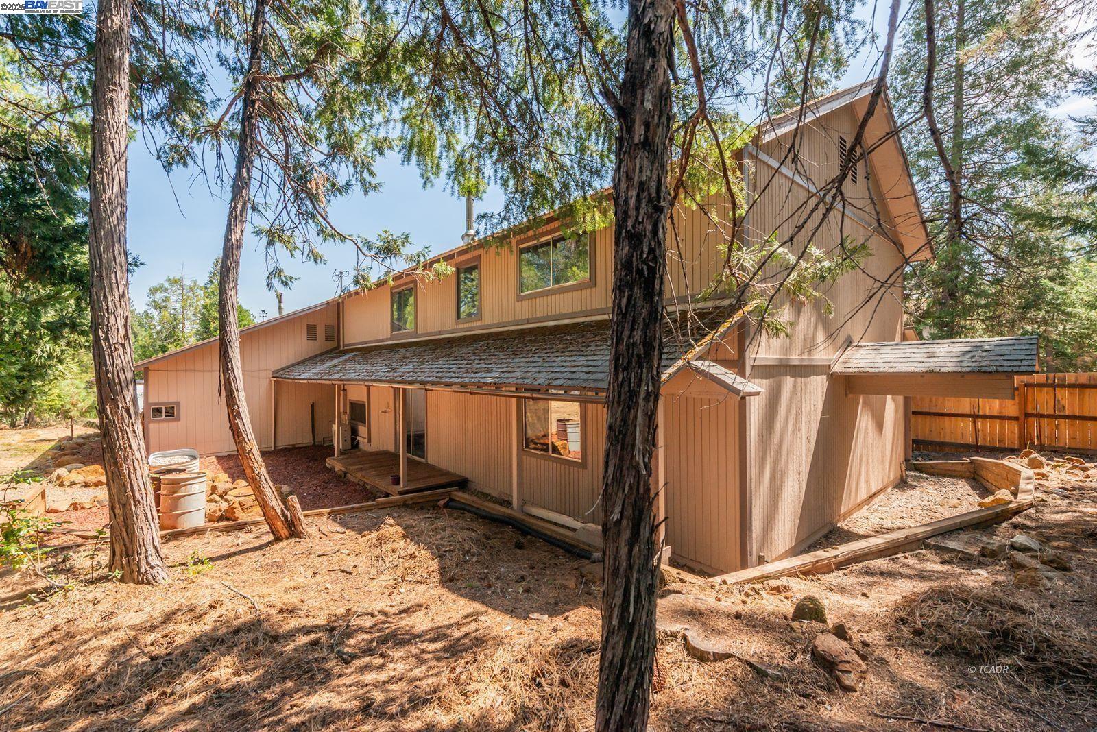 230 Mary Avenue Trinity Center, CA 96091 - Photo 43 of 46 a view of a backyard with a large tree