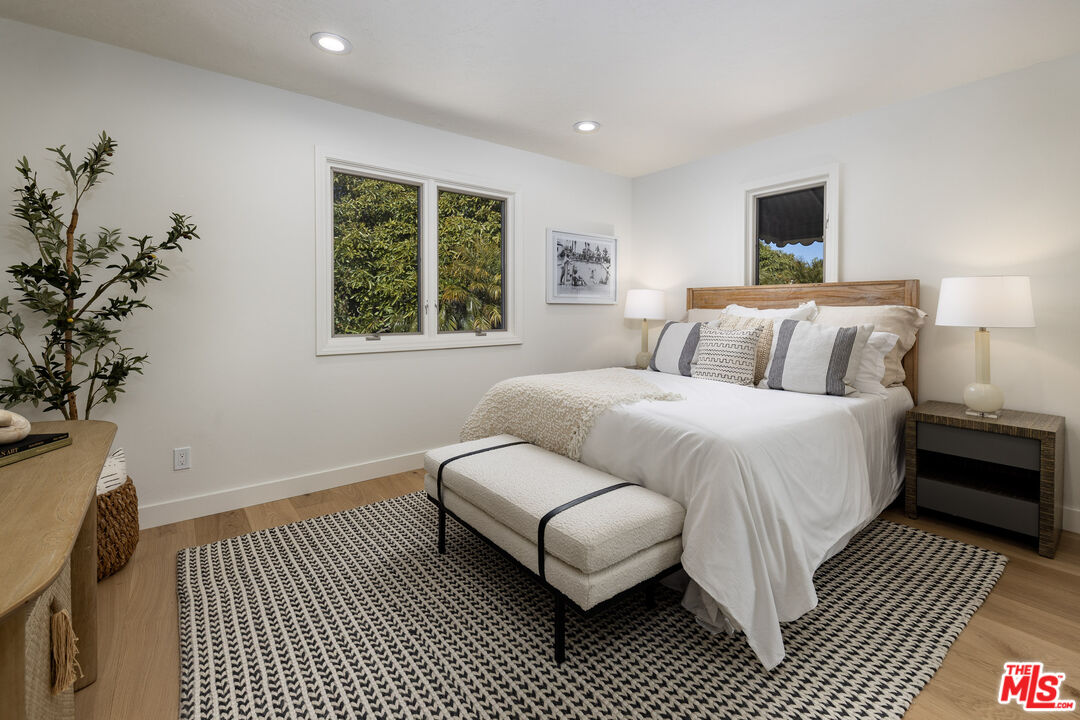10890 Highway 101 Goleta, CA 93117 - Photo 22 of 29 a bedroom with a large bed and a window