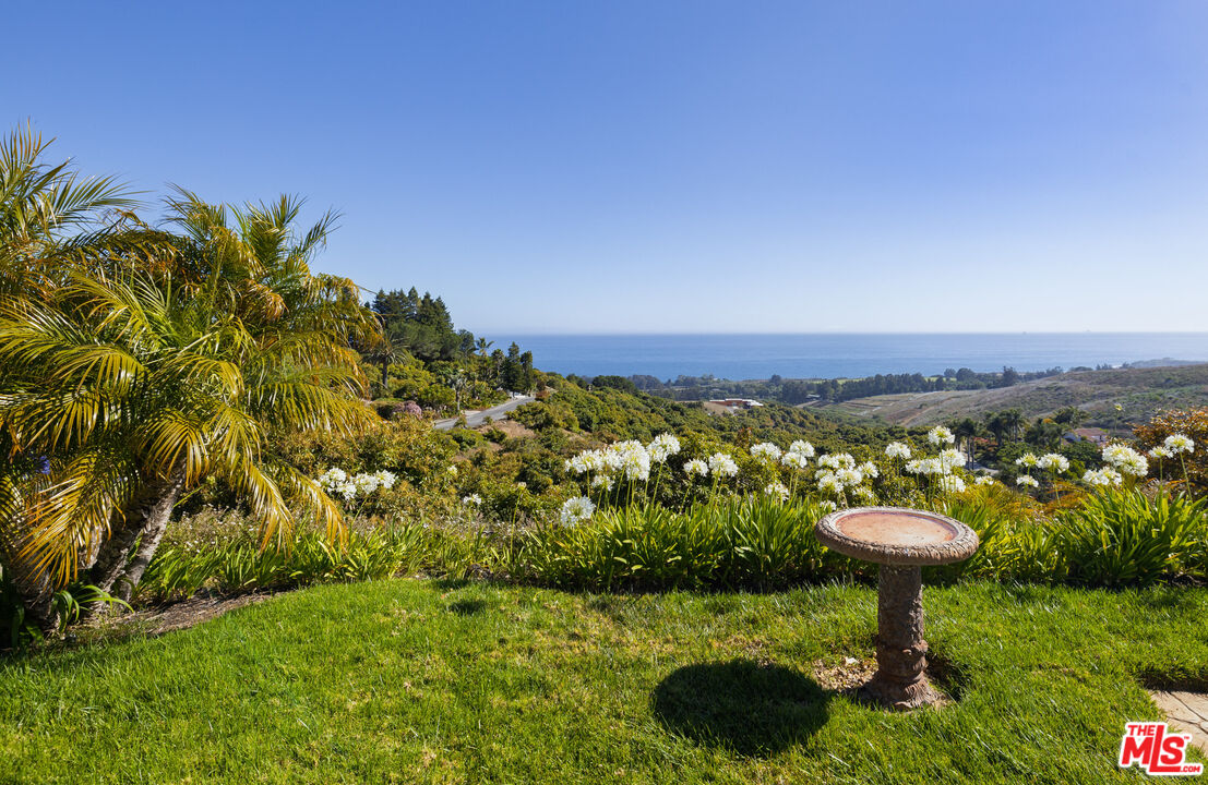 10890 Highway 101 Goleta, CA 93117 - Photo 27 of 29 a view of a lake with a garden
