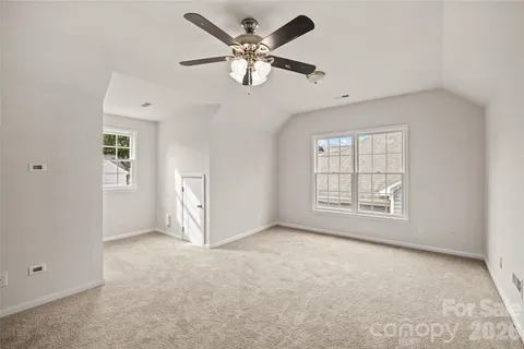 a view of backyard with trees