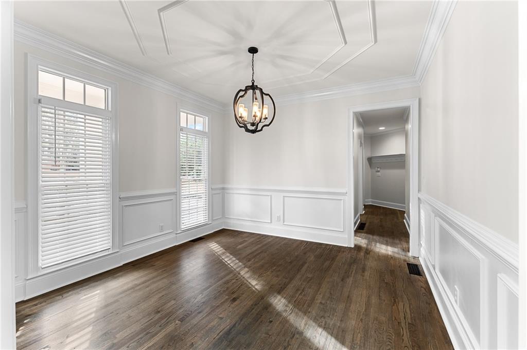 8805 Saddle Trail Ball Ground, GA 30107 - Photo 12 of 53 a view of a room with wooden floor and window