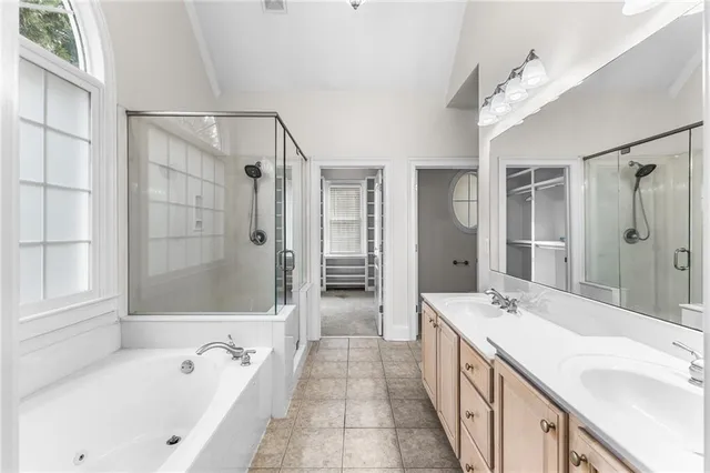 a bathroom with a sink a vanity and a mirror
