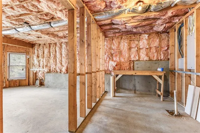 a view of a room with wooden walls