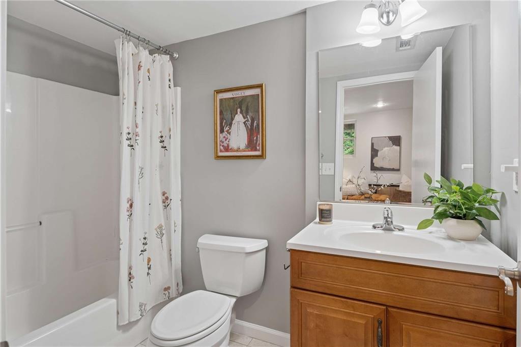 2200 Drew Valley Road Northeast Atlanta, GA 30319 - Photo 26 of 39 a bathroom with a sink toilet and shower