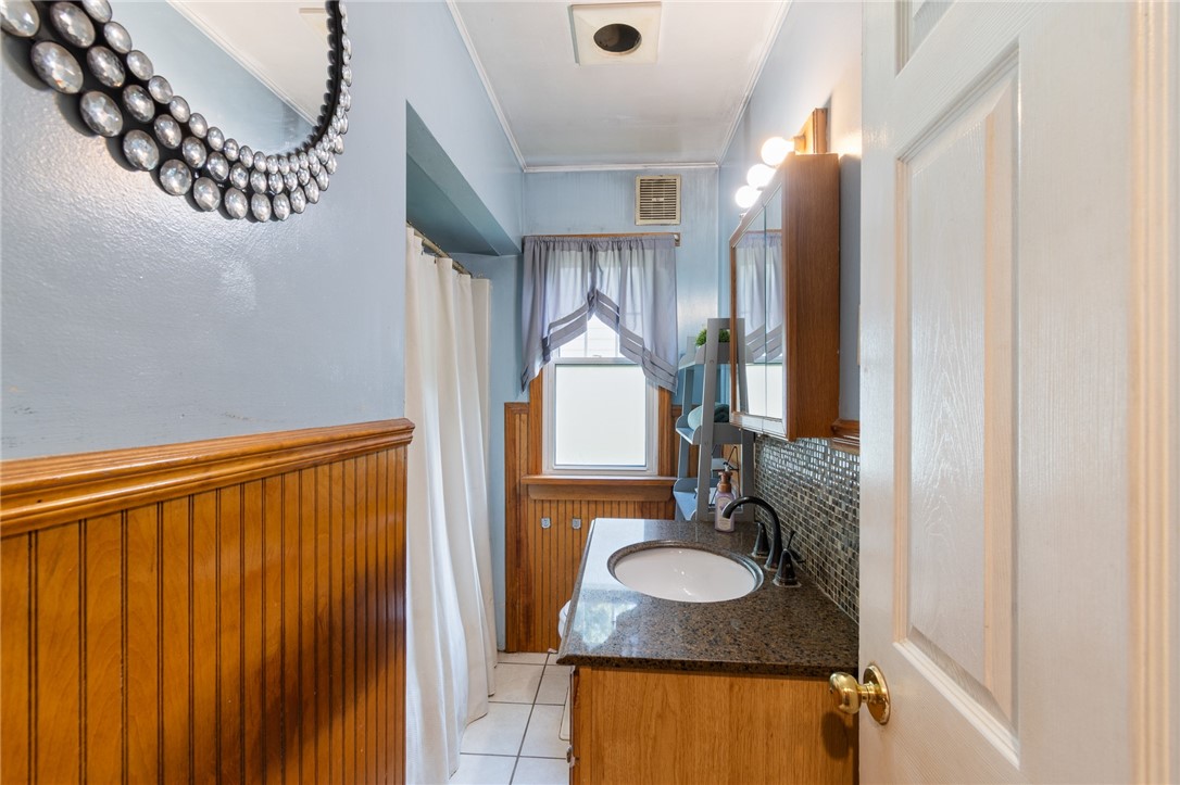 6170 Locust Street Williamson, NY 14589 - Photo 14 of 26 The first floor FULL bath