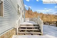 a view of a house with a street