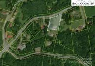 a view of a livingroom with an empty space and a fireplace