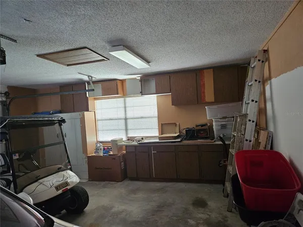 a kitchen with stainless steel appliances a refrigerator and a sink