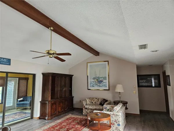 a living room with furniture and window
