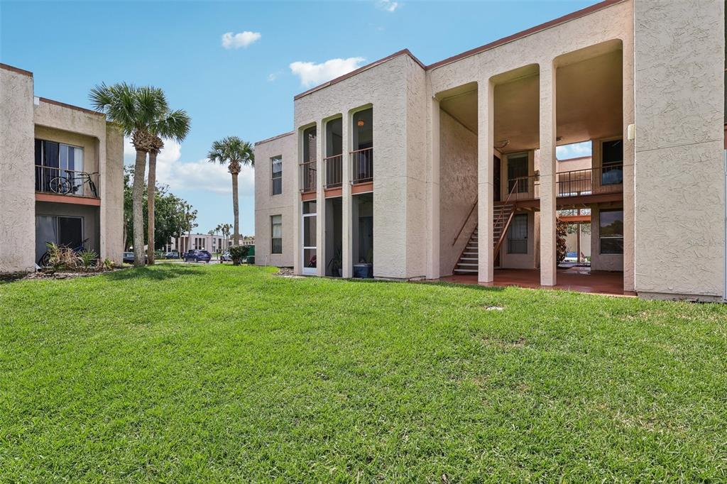 534 Orange Drive, Unit 27 Altamonte Springs, FL 32701 - Photo 21 of 24 front view of house with yard
