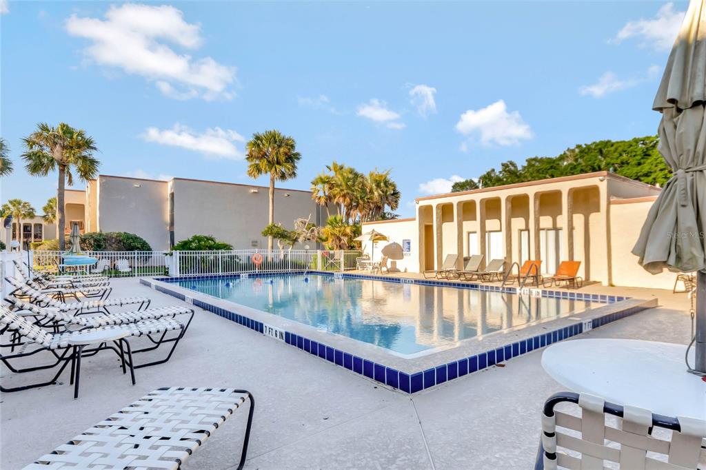 534 Orange Drive, Unit 27 Altamonte Springs, FL 32701 - Photo 24 of 24 a outdoor space with swimming pool and furniture