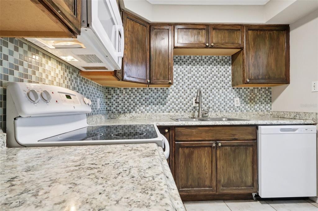 534 Orange Drive, Unit 27 Altamonte Springs, FL 32701 - Photo 7 of 24 a bathroom with a sink and a mirror