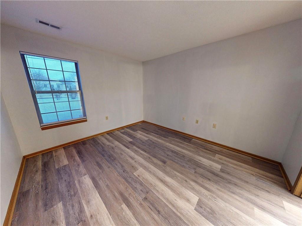 502 Brookstone Court Butler, PA 16001 - Photo 10 of 14 an empty room with windows