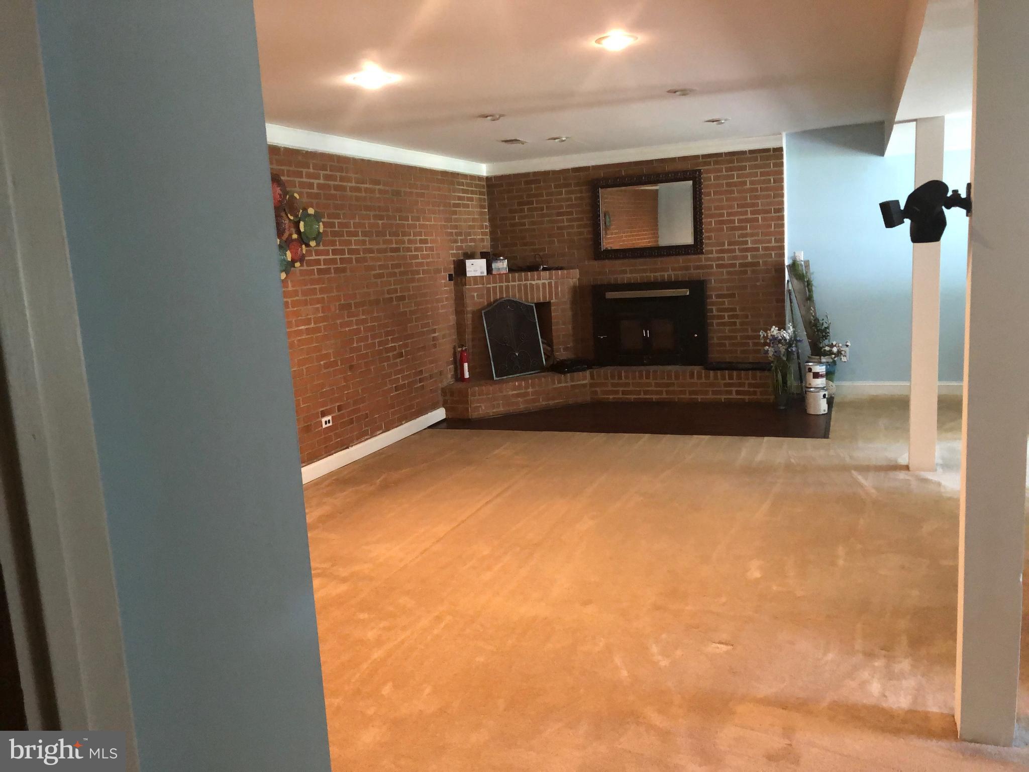 7457 Robin Road La Plata, MD 20646 - Photo 38 of 45 Basement family room walk out to back yord