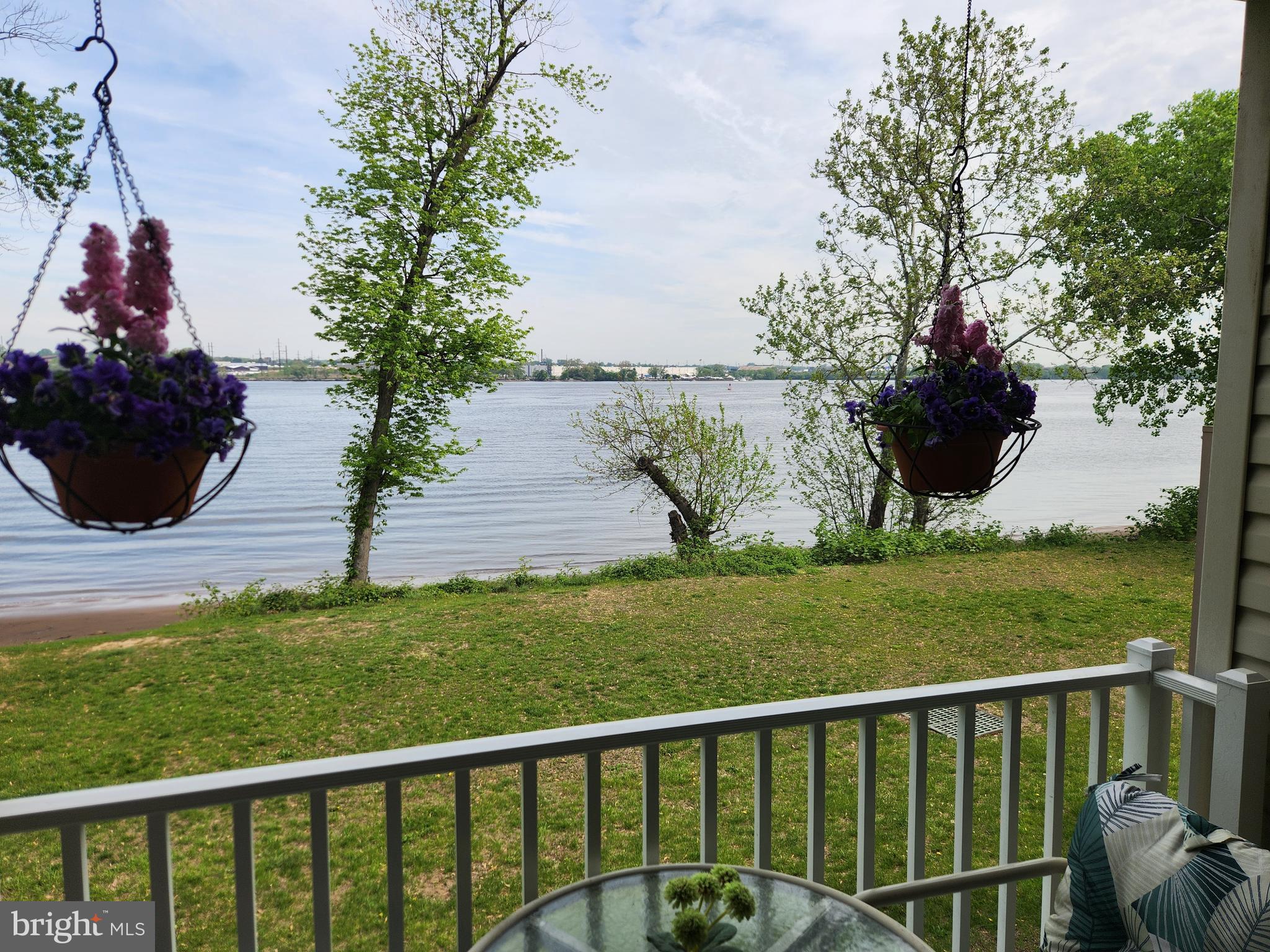 a view of a garden and lake